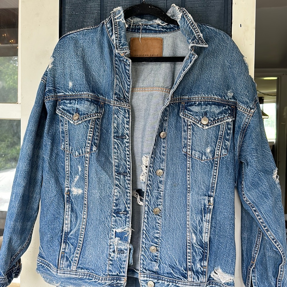 Distressed denim jacket